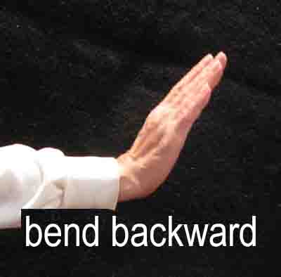 Bend backwards - photo shows horizontal arm with hand raised, palm facing forward